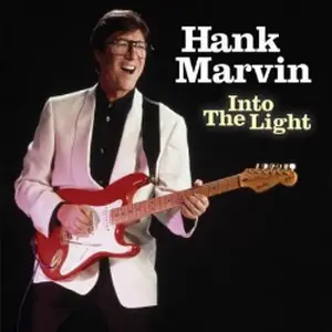 Hank Marvin displays his metallic echoed picking on a red Fender Stratocaster. A superb performance of this majestic and haunting tune "Apache," an original vinyl record memories classic by The Shadows from 1960.