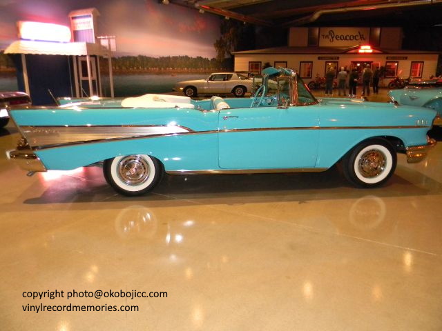 Visit the Toby Shine Okoboji Classic Cars museum, where cars like this classic 1957 Chevy are available for purchase.