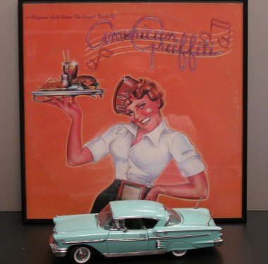My original American Graffiti album and classic '58 Chevy Impala Danbury Mint collectible, both purchased new. My original American Graffiti album and classic '58 Chevy Impala Danbury Mint collectible, both purchased new.